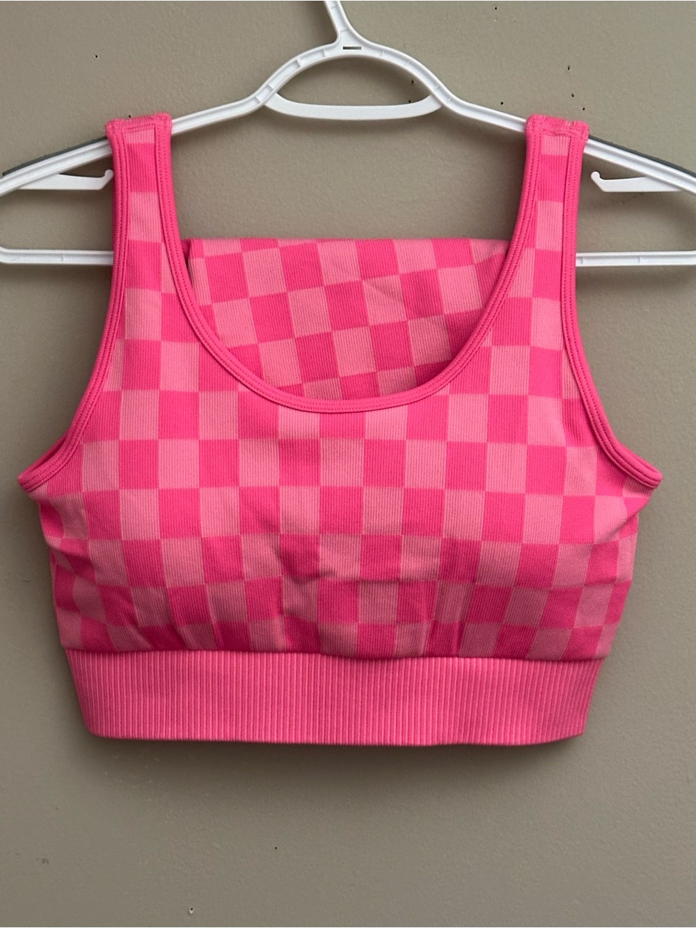 Seamless Pink Checker Sports Bra with Ribbed Support and matching shorts.